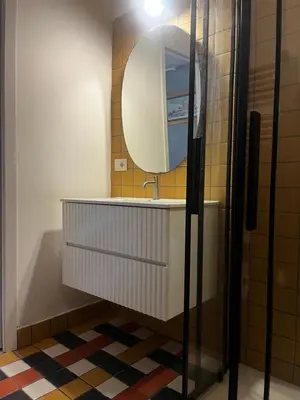 a bathroom with a sink and a mirror at trastevere' s Musa in Rome