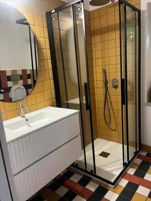 a bathroom with a sink and a shower at trastevere' s Musa in Rome