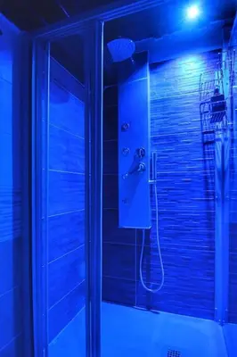 a bathroom with a shower with a glass door at Hidden Treasure-Campo de' Fiori in Rome
