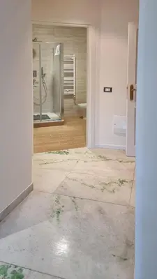 an empty room with a shower and a bathroom at Vignola New Apartment in Rome