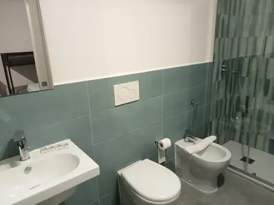 a bathroom with a sink and a toilet and a shower at Air Vatican in Rome