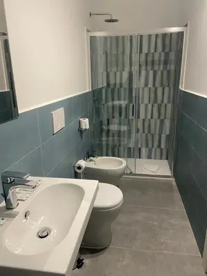 a bathroom with a sink and a toilet and a shower at Air Vatican in Rome