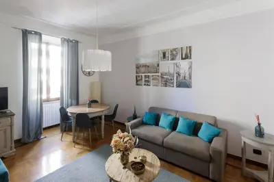 a living room with a couch and a table at 
