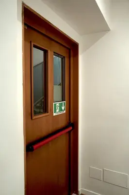 a hallway with stairs in a building at Lexie Suites in Rome