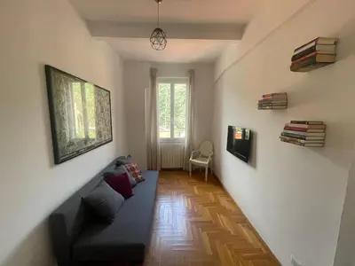 a living room with a couch and a window at Casa Vittoria Stadio olimpico con panorama in Rome