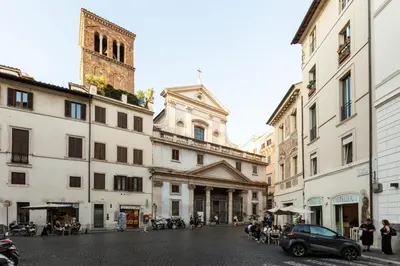 a city street with buildings and a clock tower at Pantheon Palazzo Nari #9 in Rome