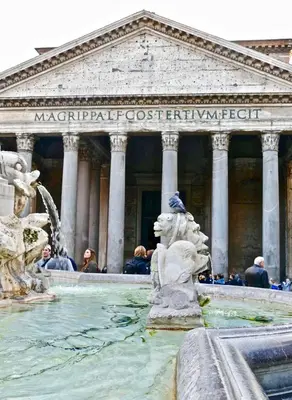 a building with a fountain in front of a building at Pantheon Palazzo Nari #9 in Rome