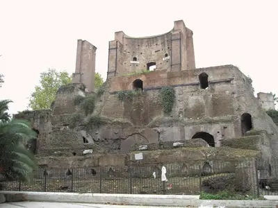 an old building with a fence in front of it at Bed and Breakfast Piazza Vittorio87 in Rome
