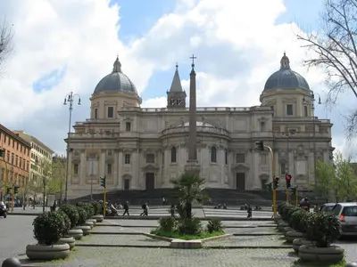 a large building with a cross on top of it at Bed and Breakfast Piazza Vittorio87 in Rome