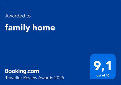 a blue screen with the text awarded to family home and a house at family home in Rome