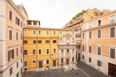 a group of buildings in a city at iFlat Golden Gem in Trevi in Rome