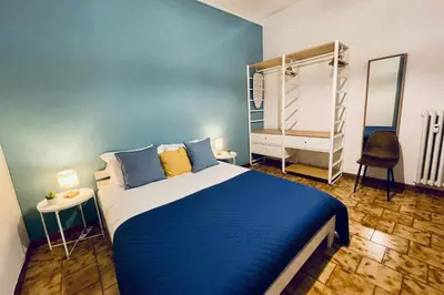 a bedroom with a bed with towels on it at Monteverde Hideaway in Rome