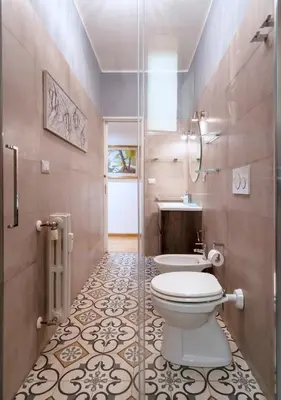 a bathroom with a toilet and a sink at Ripetta Beauty House in Rome