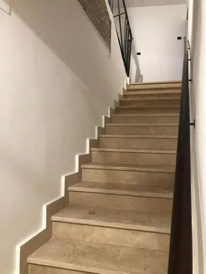a staircase in a building with concrete steps at Appartamento centro storico BACCINAHOME in Rome