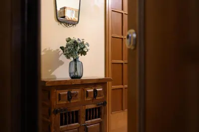 a living room with a couch and a bed at La Dimora del Vagamondo - ingresso in comune in Rome