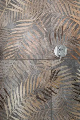a close up of a tile floor with a mouse at Stevenson Rooms in Rome