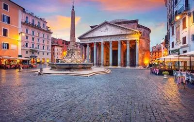 a city square with a fountain in front of a building at PANTHEON allo SCRIGNO in Rome