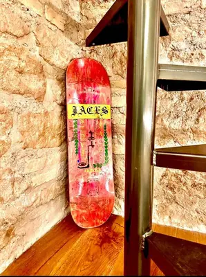 a skateboard is leaning against a brick wall at Buonarroti Art Home - Luxury and Art in Rome in Rome