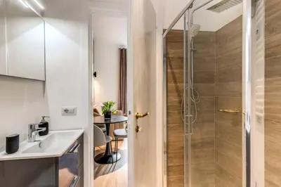a bathroom with a shower and a sink at Vatican Charming Home in Rome