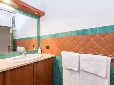 a bathroom with a sink and a mirror at Apartment Navona by Interhome in Rome