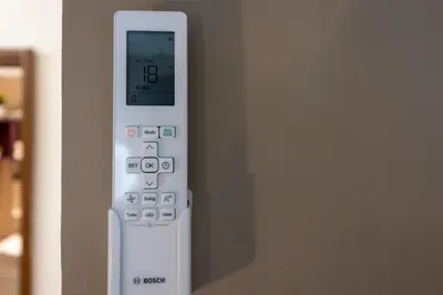a remote control is attached to a wall at Big Apartment Rome Air Conditioning WIFI Netflix 90 MQ in Rome