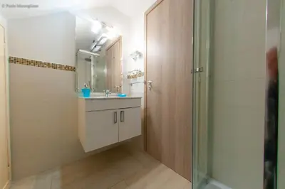 a bathroom with a sink and a shower at Algima Flat Roma Ponte Milvio in Rome