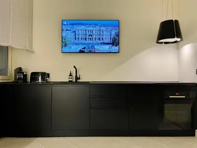 a bedroom with a white bed and a window at Apartment in the heart of Rome in Rome