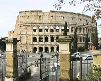 a large building with a gate in front of it at Pensiero Romano in Rome