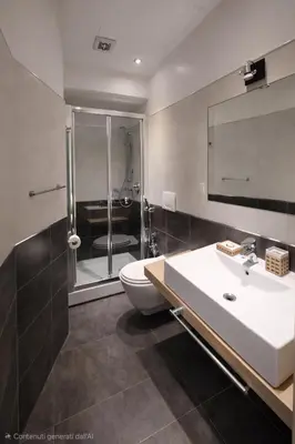 a bathroom with a toilet and a shower and a sink at RomAntic Dreams Sistina Guest House in Rome