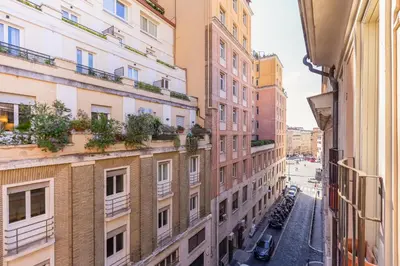 an alley in a city with buildings at Barberini Exclusive Loft in Rome