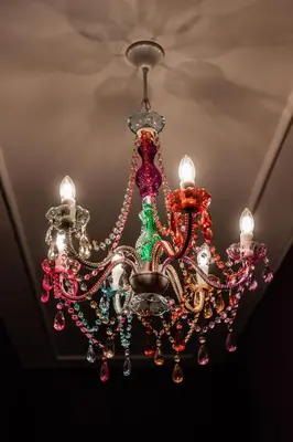 a chandelier hanging from a ceiling at Telesio Suite in Rome