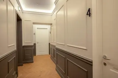 a hallway with a number four on the wall at Porta Castello Suites in Rome