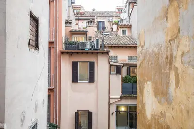 an alley between two buildings in a city at Collection Spanish Steps Apartments in Rome