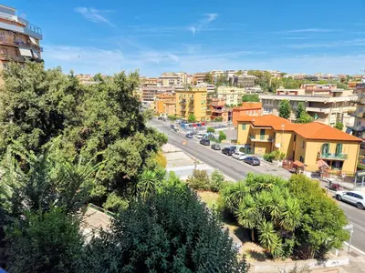 an aerial view of a city with buildings and trees at Grazia Guesthouse in Rome