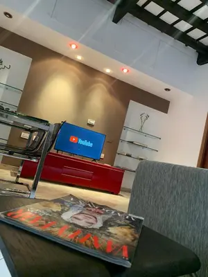 a store with a counter with a computer on it at Mc - Trastevere in Rome