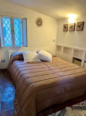 a bedroom with a large bed in a room at La Rosa di piazza Spagna in Rome