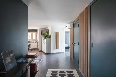 a living room with a desk and a room with a bedroom at Loft 36 by Nosdom Properties in Rome