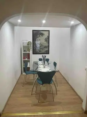 a dining room with a table and chairs at Domus Roma Esquilino in Rome