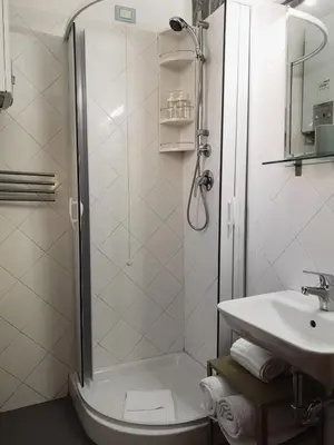 a bathroom with a shower and a sink at House Villa Fiorelli in Rome