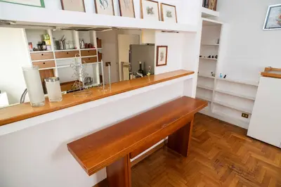a bar in a room with a wooden counter at Tamara e Gerardina House in Trastevere in Rome