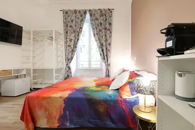 a glass shower in a bathroom with a sink at Molly Home in Rome