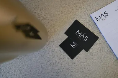 two pieces of paper with the wordms on it at Màs Boutique Hotel Rome in Rome