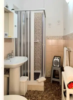 a bathroom with a shower and a sink and a shower at Bed and Breakfast Mamma Giuliana in Rome