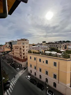 a view of a city street with buildings at La Maison Royale in Rome