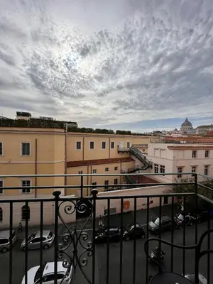 a view of a parking lot from a balcony at La Maison Royale in Rome