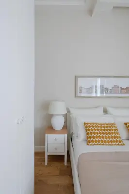a bedroom with two beds and a table with a lamp at THE BREAK - Piazza di Spagna Maison Deluxe Terrace in Rome