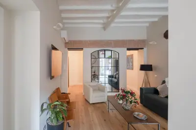 a living room with a couch and a table at THE BREAK - Piazza di Spagna Maison Deluxe Terrace in Rome