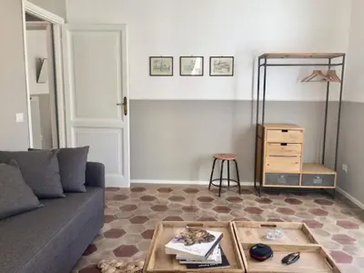 a living room with a couch and a coffee table at Roma Testaccio - Volta 45 apartment in Rome