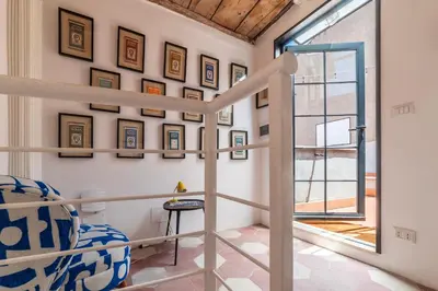 a bedroom with a bunk bed and a window at GuestHost - Cancelleria Rooftop Garden in Rome