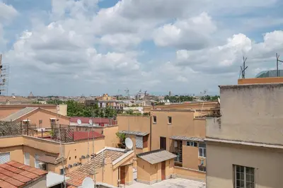 a view of a city with buildings at Trastevere at heart in Rome